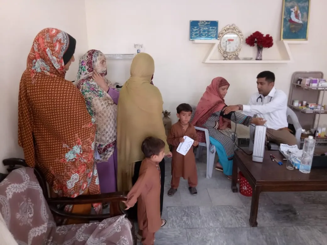 Families waiting at the Gujar Khan clinic